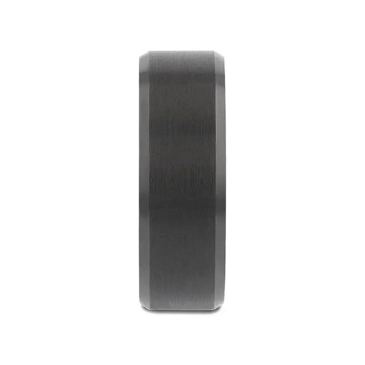 Profile view showing the ring’s flat brushed center band and beveled edges