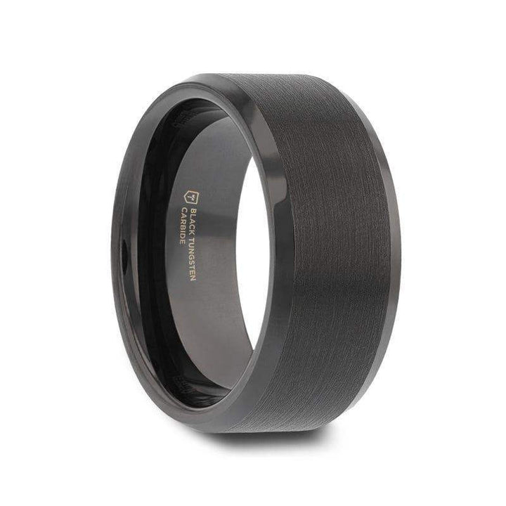 Model wearing a black brushed tungsten ring on the ring finger