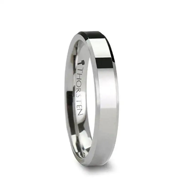 Slim cobalt chrome ring with beveled edges and polished finish, engraved THORSTEN on inner band, angled view