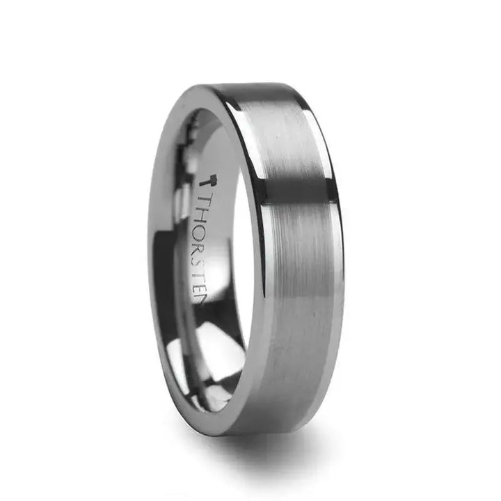 Flat tungsten carbide wedding band with brushed center and polished edges, angled view