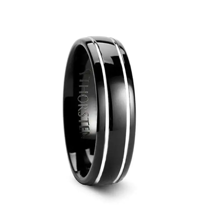 Narrow-angle side view of domed black tungsten carbide ring featuring two polished offset grooves