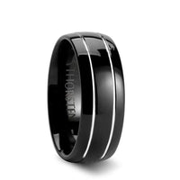 Domed black tungsten carbide ring with two polished offset grooves, angled side view
