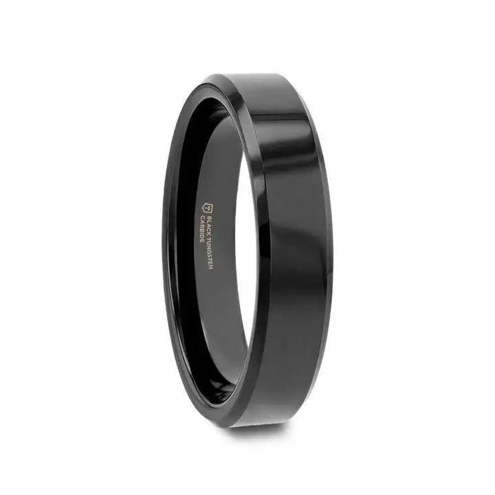 Black tungsten carbide ring with beveled edges, angled side view