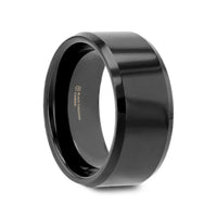 Angled view of a glossy black tungsten carbide ring with beveled edges, 10mm width
