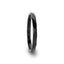 Side view of a 2mm women’s black tungsten carbide ring with diamond-faceted pattern and polished interior