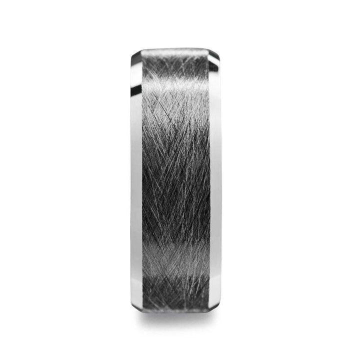 Front view showing the wire-brushed texture centered between polished beveled edges