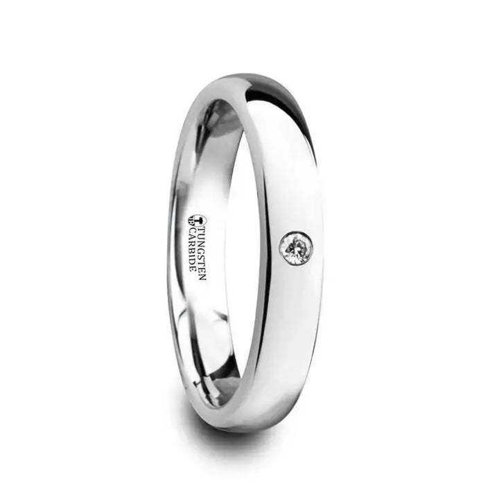 Angled view of the narrower BERKSHIRE domed tungsten carbide ring with bezel-set diamond