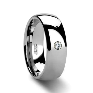 Side view of the BERKSHIRE domed tungsten carbide ring featuring a bezel-set round diamond accent