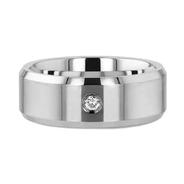 Flat lay of tungsten carbide wedding band highlighting beveled edges and single bezel-set diamond