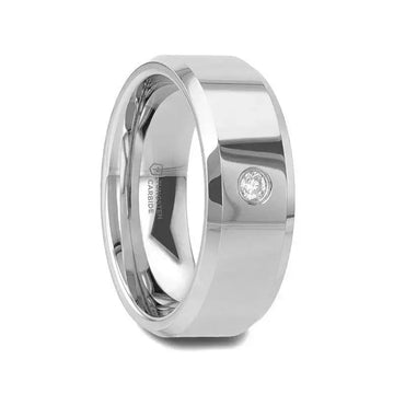 Side view of polished tungsten carbide wedding band with beveled edges and bezel-set round diamond