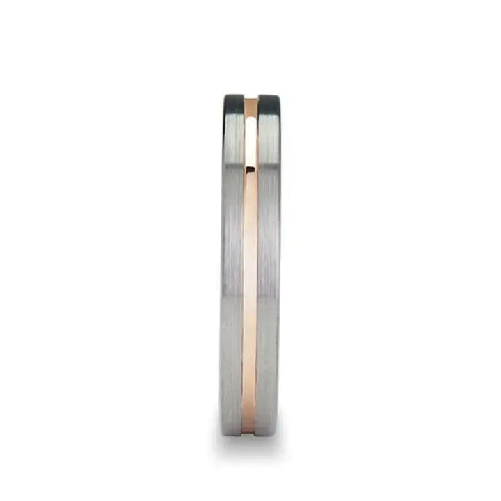 Lifestyle shot of a hand wearing a flat brushed tungsten carbide ring with a rose gold-colored center channel
