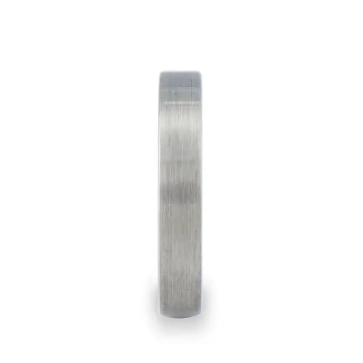 Narrow profile view of flat brushed tungsten carbide wedding band