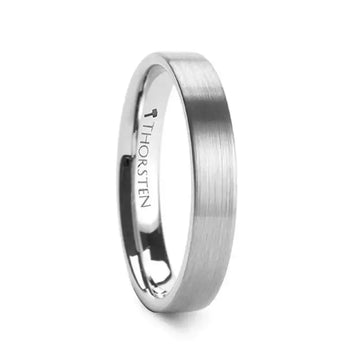 Flat brushed tungsten carbide wedding band with polished interior, side angle view