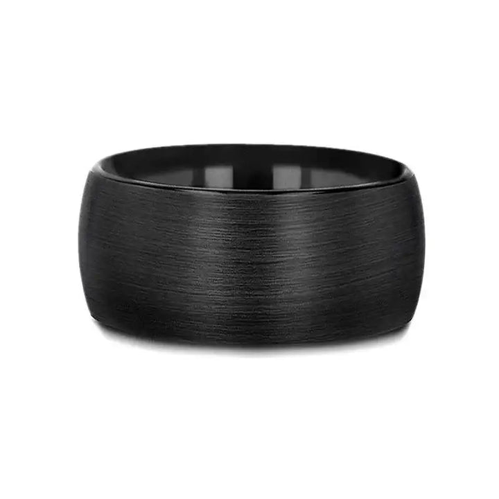 Flat lay of the 12mm domed black tungsten carbide ring highlighting the brushed texture