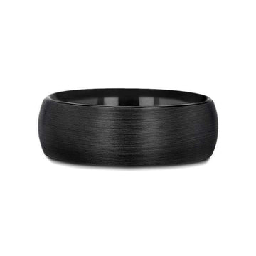 Side profile of the domed brushed black tungsten wedding band showing curvature