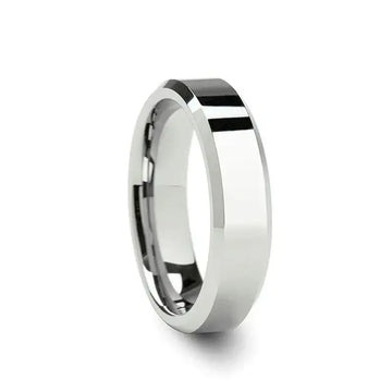 Angled view of a medium-width white tungsten wedding band with beveled edges
