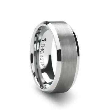 Model wearing the SAIRA white tungsten carbide ring with brushed center and polished beveled edges