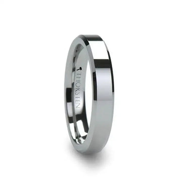 Polished silver-tone tungsten carbide ring with flat top and beveled edges, interior engraved THORSTEN, angled view