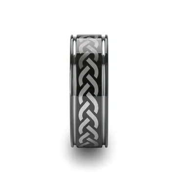 Front profile of the 8mm black tungsten carbide ring showing the continuous laser-engraved Celtic knot band